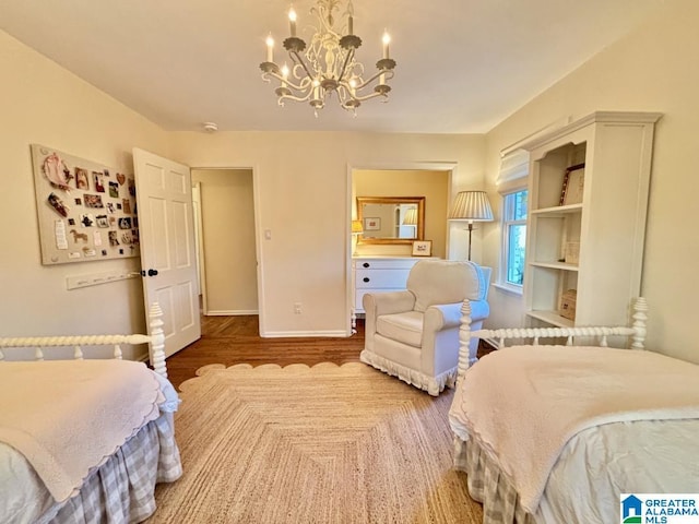 2713 Altadena Lake Rd, Birmingham, AL 35243 - bedroom with a chandelier and wood finished floors