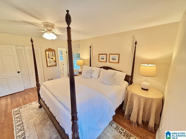 2713 Altadena Lake Rd, Birmingham, AL 35243 - bedroom featuring wood finished floors, a ceiling fan, and a closet