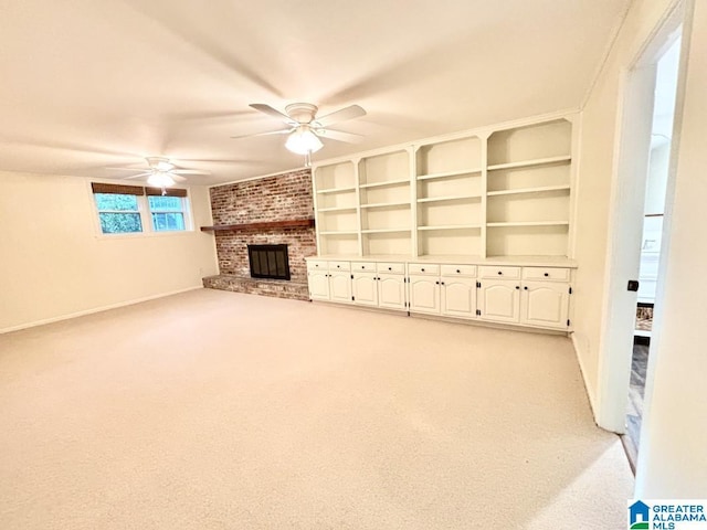 2713 Altadena Lake Rd, Birmingham, AL 35243 - unfurnished living room featuring a brick fireplace, a ceiling fan, light colored carpet, and built in features