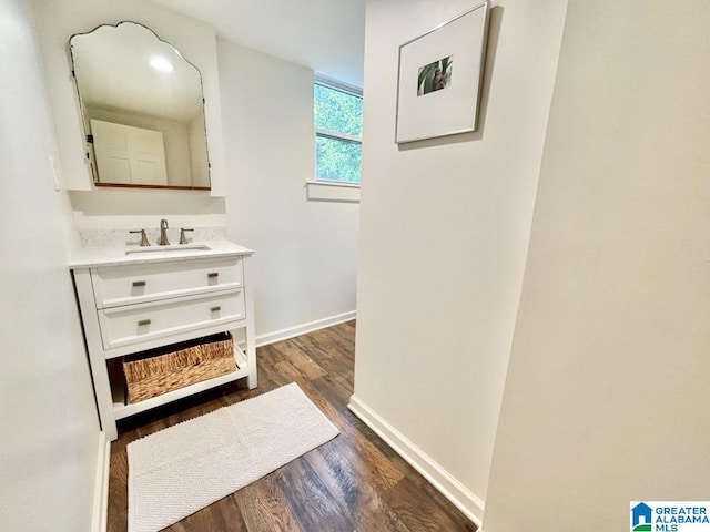 2713 Altadena Lake Rd, Birmingham, AL 35243 - bathroom with wood finished floors and vanity