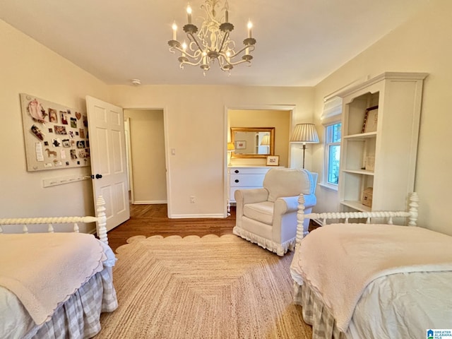 2713 Altadena Lake Rd, Birmingham, AL 35243 - bedroom featuring a chandelier and wood finished floors