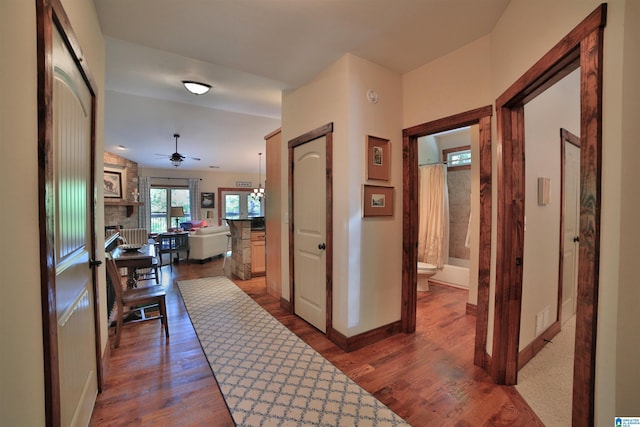 566 County Road 897, Wedowee, AL 36278 - hallway with dark wood-style flooring and baseboards
