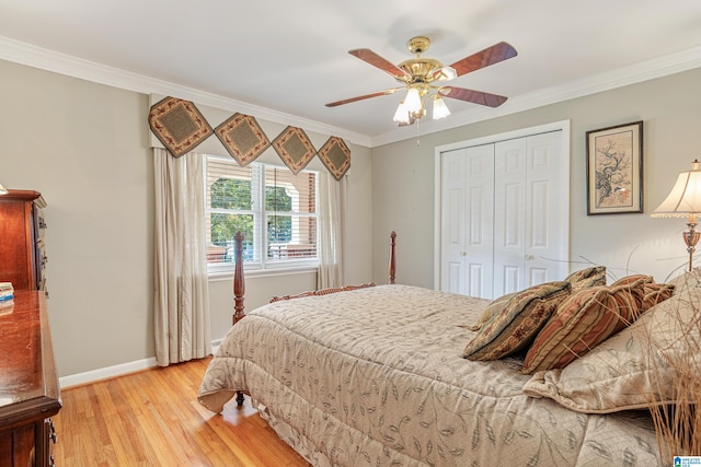 2026 Pinehurst Dr, Gardendale, AL 35071 - bedroom featuring crown molding, a closet, light wood-style floors, and ceiling fan