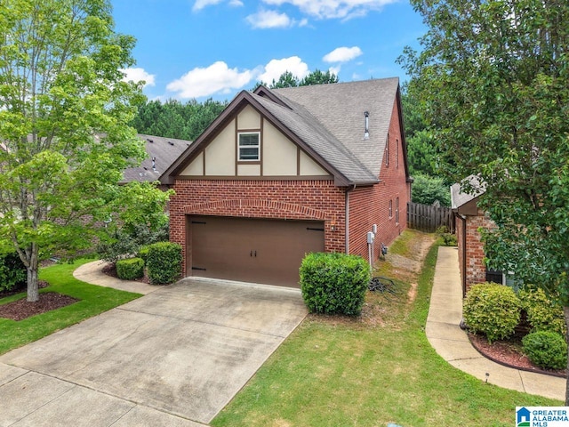 5633 Park Side Rd, Hoover, AL 35244 - view of front facade featuring brick siding, stucco siding, a garage, driveway, and a shingled roof
