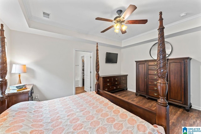 5633 Park Side Rd, Hoover, AL 35244 - bedroom with dark wood-type flooring, a tray ceiling, ornamental molding, and ceiling fan