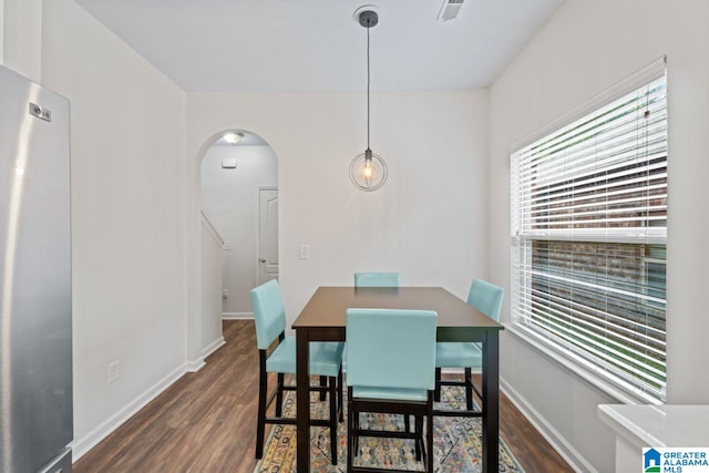 5633 Park Side Rd, Hoover, AL 35244 - dining space with dark wood finished floors and arched walkways