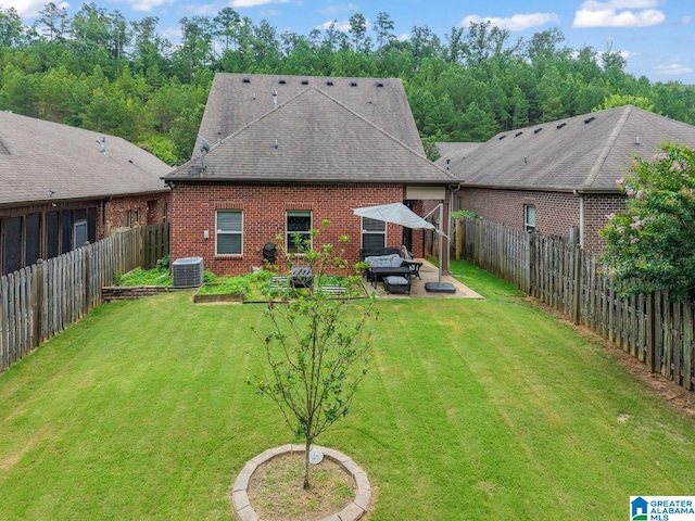 5633 Park Side Rd, Hoover, AL 35244 - rear view of house with a patio area, brick siding, a fenced backyard, and a shingled roof