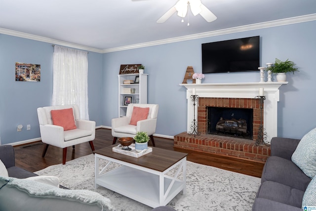 3624 Robin Cir, Birmingham, AL 35242 - living area with wood finished floors, ornamental molding, a ceiling fan, and a fireplace