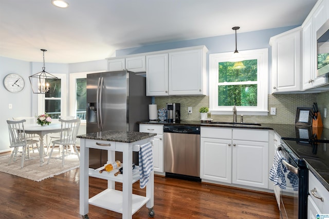 3624 Robin Cir, Birmingham, AL 35242 - kitchen with stainless steel appliances, white cabinets, backsplash, and recessed lighting