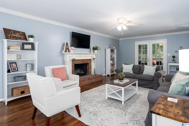 3624 Robin Cir, Birmingham, AL 35242 - living room featuring crown molding, a ceiling fan, dark wood-style flooring, french doors, and a brick fireplace