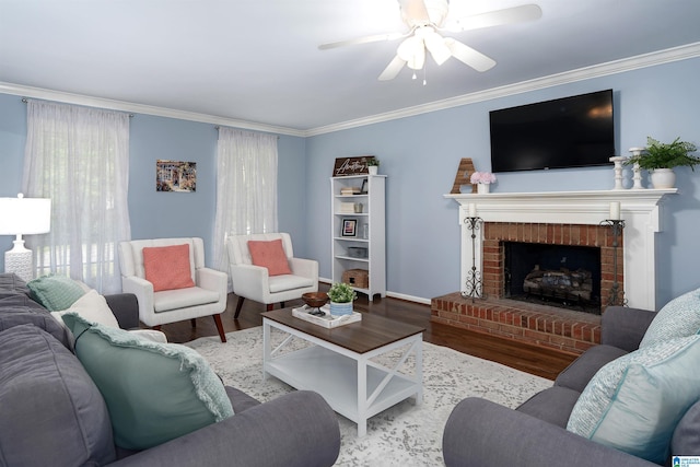 3624 Robin Cir, Birmingham, AL 35242 - living room with wood finished floors, crown molding, a ceiling fan, and a brick fireplace