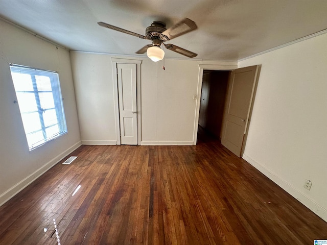 2910 Old Gadsden Hwy, Anniston, AL 36206 - unfurnished bedroom with dark wood-type flooring and a ceiling fan