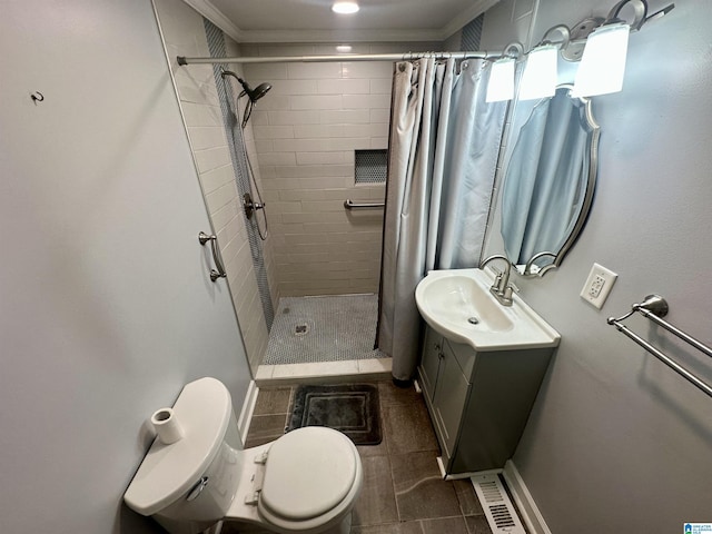 2910 Old Gadsden Hwy, Anniston, AL 36206 - bathroom featuring vanity, a stall shower, ornamental molding, and tile patterned floors