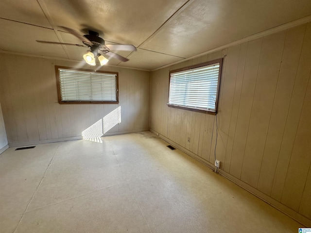 2910 Old Gadsden Hwy, Anniston, AL 36206 - unfurnished room with a ceiling fan and wooden walls