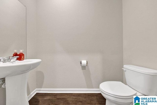 6370 Rainbow Row, Pell City, AL 35128 - bathroom with baseboards and wood finished floors