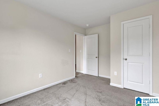 6370 Rainbow Row, Pell City, AL 35128 - unfurnished bedroom with baseboards and carpet floors
