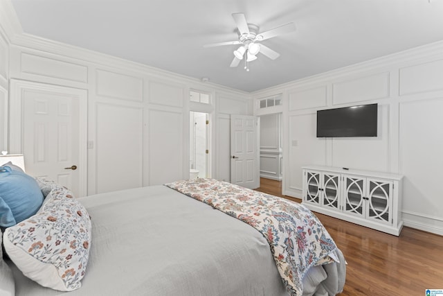 5615 Canongate Ln, Hoover, AL 35242 - bedroom featuring dark wood finished floors, a decorative wall, and ceiling fan