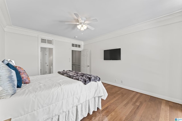 5615 Canongate Ln, Hoover, AL 35242 - bedroom featuring ornamental molding, wood finished floors, and a ceiling fan