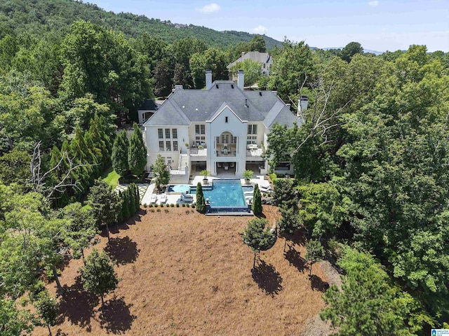 5615 Canongate Ln, Hoover, AL 35242 - view of subject property with a forest and a pool