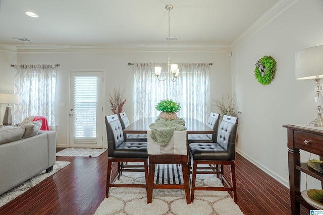 4955 Stonecreek Way, Calera, AL 35040 - dining area featuring crown molding, a chandelier, and wood-type flooring