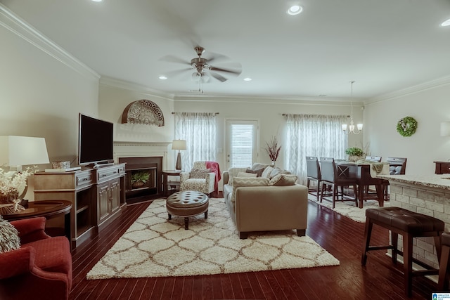 4955 Stonecreek Way, Calera, AL 35040 - living room with a ceiling fan, a fireplace, dark wood-type flooring, crown molding, and recessed lighting