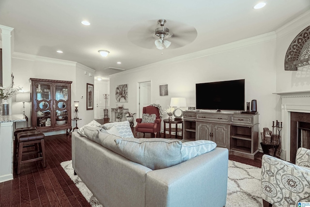 4955 Stonecreek Way, Calera, AL 35040 - living area featuring crown molding, ceiling fan, recessed lighting, wood finished floors, and a fireplace