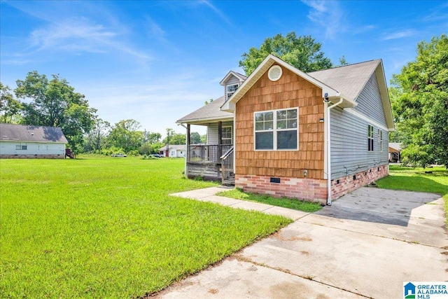 1324 Fulton Ave SW, Birmingham, AL 35211 - view of front of property featuring crawl space, a porch, a front lawn, and concrete driveway