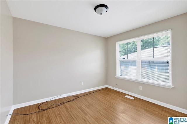1324 Fulton Ave SW, Birmingham, AL 35211 - empty room with baseboards and wood finished floors