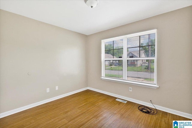 1324 Fulton Ave SW, Birmingham, AL 35211 - empty room featuring baseboards and wood finished floors