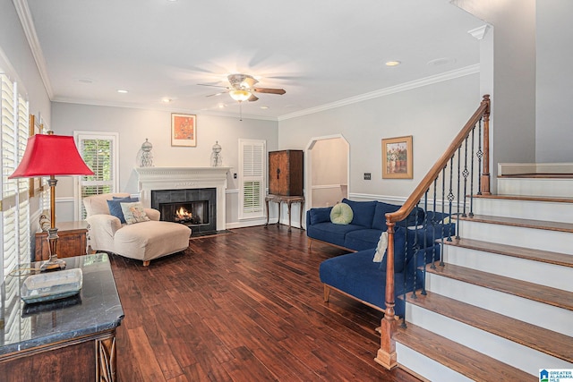 1813 Southpointe Cir, Hoover, AL 35244 - living area featuring ceiling fan, wood finished floors, stairs, a fireplace with flush hearth, and crown molding