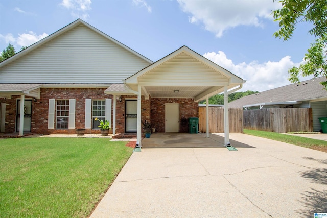 1822 Oakleaf Ln, Center Point, AL 35215 - view of front of property with driveway, brick siding, and a carport