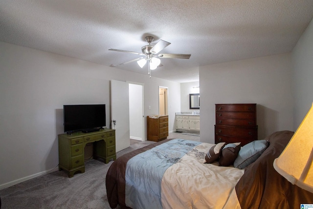 1822 Oakleaf Ln, Center Point, AL 35215 - bedroom featuring carpet floors, connected bathroom, a ceiling fan, and a textured ceiling