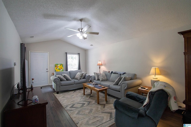 1822 Oakleaf Ln, Center Point, AL 35215 - living room with ceiling fan, wood finished floors, vaulted ceiling, and a textured ceiling