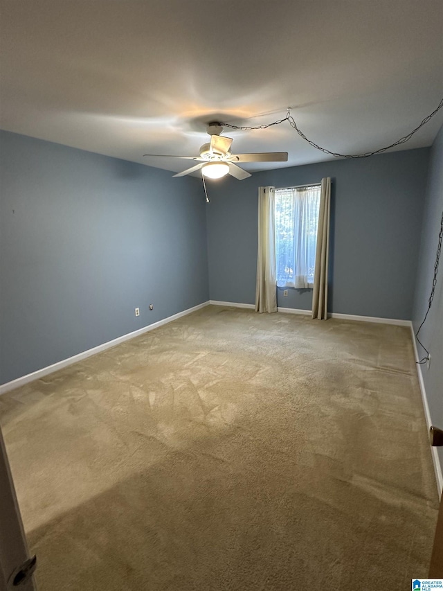 3011 Massey Rd Unit E, Vestavia Hills, AL 35216 - carpeted spare room featuring a ceiling fan and baseboards