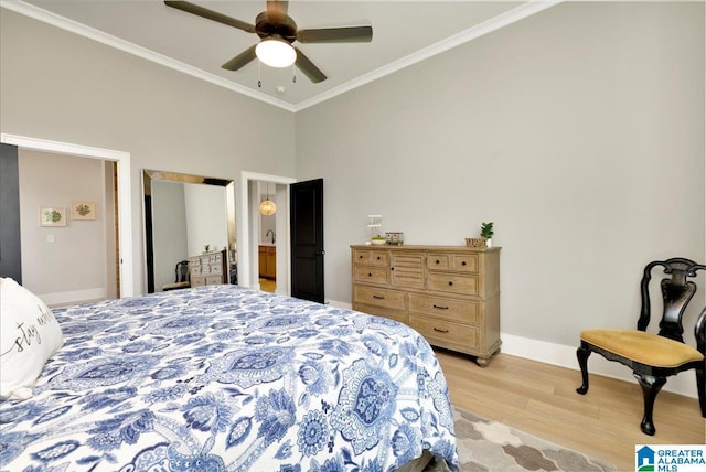 4549 Brexton St, Trussville, AL 35173 - bedroom with light wood-style flooring, ornamental molding, and ceiling fan