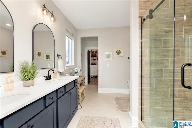 4549 Brexton St, Trussville, AL 35173 - full bathroom featuring a shower stall, double vanity, and a walk in closet