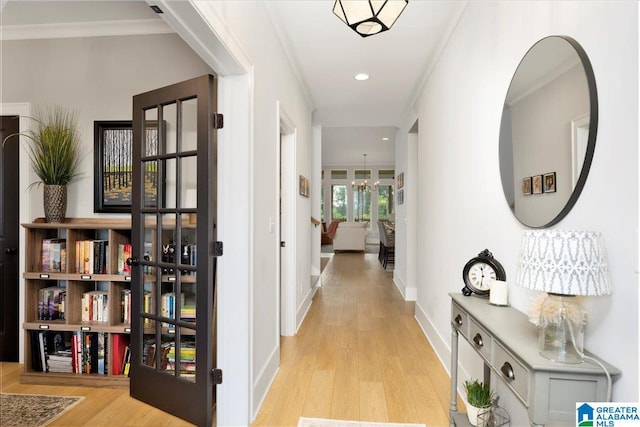 4549 Brexton St, Trussville, AL 35173 - hallway featuring wood finished floors, french doors, recessed lighting, and ornamental molding