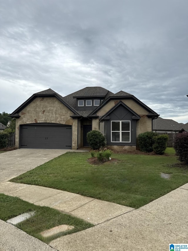 2312 Dunbar Cir, Moody, AL 35004 - view of front facade with driveway, a garage, and roof with shingles