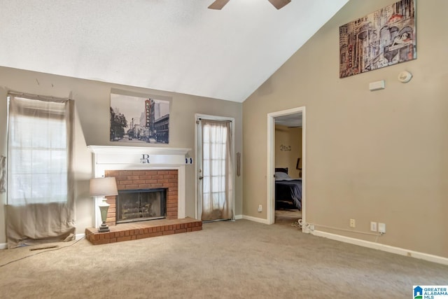 7839 Old Bradford Rd, Pinson, AL 35126 - unfurnished living room with carpet floors, ceiling fan, a fireplace, and high vaulted ceiling
