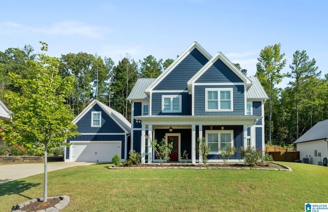2024 Adams Ridge Dr, Chelsea, AL 35043 - view of front of home featuring a porch, board and batten siding, a metal roof, a detached garage, and a standing seam roof