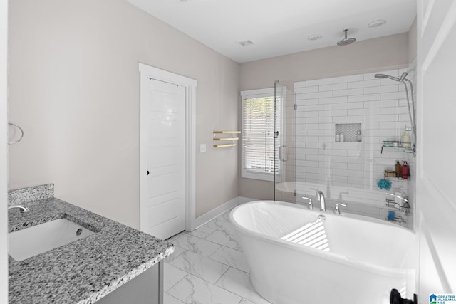2024 Adams Ridge Dr, Chelsea, AL 35043 - full bathroom with marble look tile flooring, a freestanding bath, vanity, and a tile shower