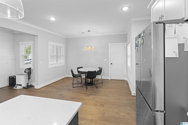 2024 Adams Ridge Dr, Chelsea, AL 35043 - dining room with light wood finished floors, ornamental molding, recessed lighting, and a chandelier
