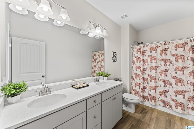 189 Ridgeline Dr, Chelsea, AL 35043 - full bath with double vanity, a shower with curtain, and wood finished floors