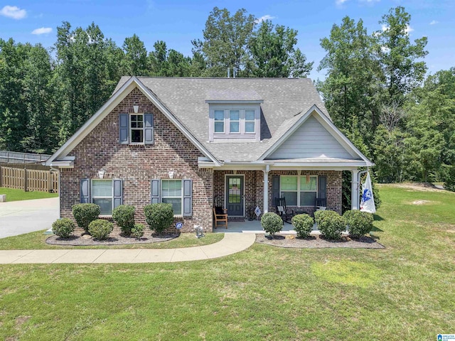 189 Ridgeline Dr, Chelsea, AL 35043 - view of front of house with brick siding, covered porch, and roof with shingles