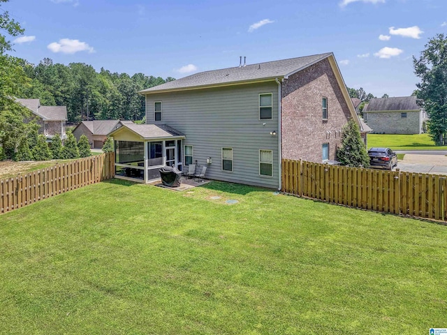 189 Ridgeline Dr, Chelsea, AL 35043 - back of house featuring a sunroom, a fenced backyard, and a patio area