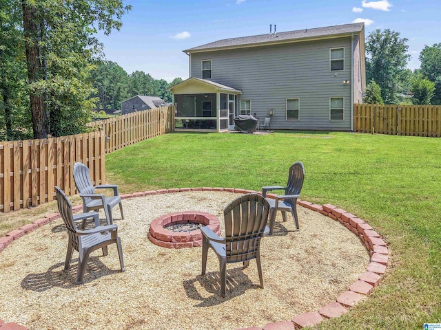 189 Ridgeline Dr, Chelsea, AL 35043 - rear view of property with a fire pit, a sunroom, a fenced backyard, and a patio