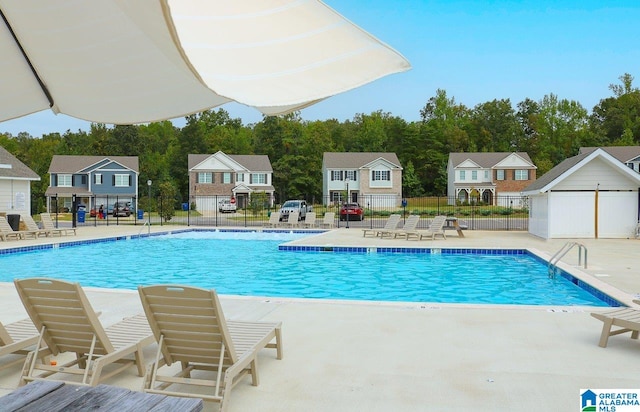 2037 Gadwall Dr, Alabaster, AL 35007 - community pool with a patio and a residential view