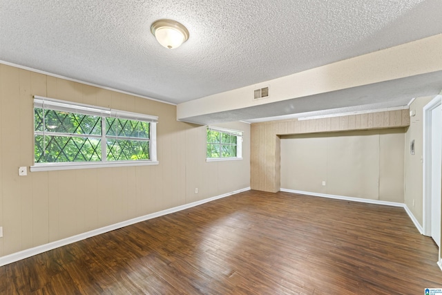 540 Harlem Ave, Hueytown, AL 35023 - unfurnished room featuring wood finished floors and a textured ceiling
