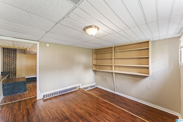 540 Harlem Ave, Hueytown, AL 35023 - spare room featuring wood finished floors and built in features