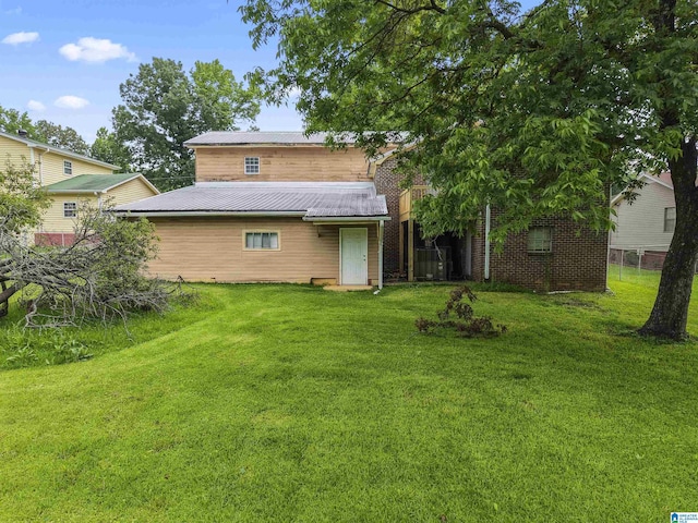540 Harlem Ave, Hueytown, AL 35023 - back of house featuring a metal roof